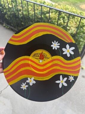 Black Vinyl Wall Art with Yellow & Orange Waves and White Daisies